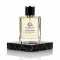 Perfume bottle labeled 'Zephrone' by Zeanor Scents on a black marble platform.